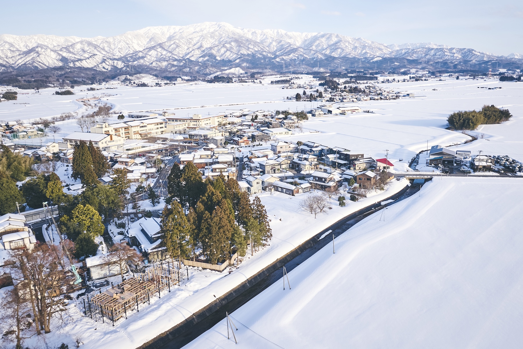 Aerial view of Né set against the rice fields of Niigata, snow country, Japan | The Aficionados.